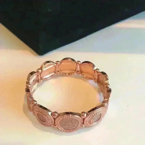 Macy’s new copper colored faux diamond bracelet - Picture 4 of 8